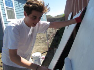 Young person painting.