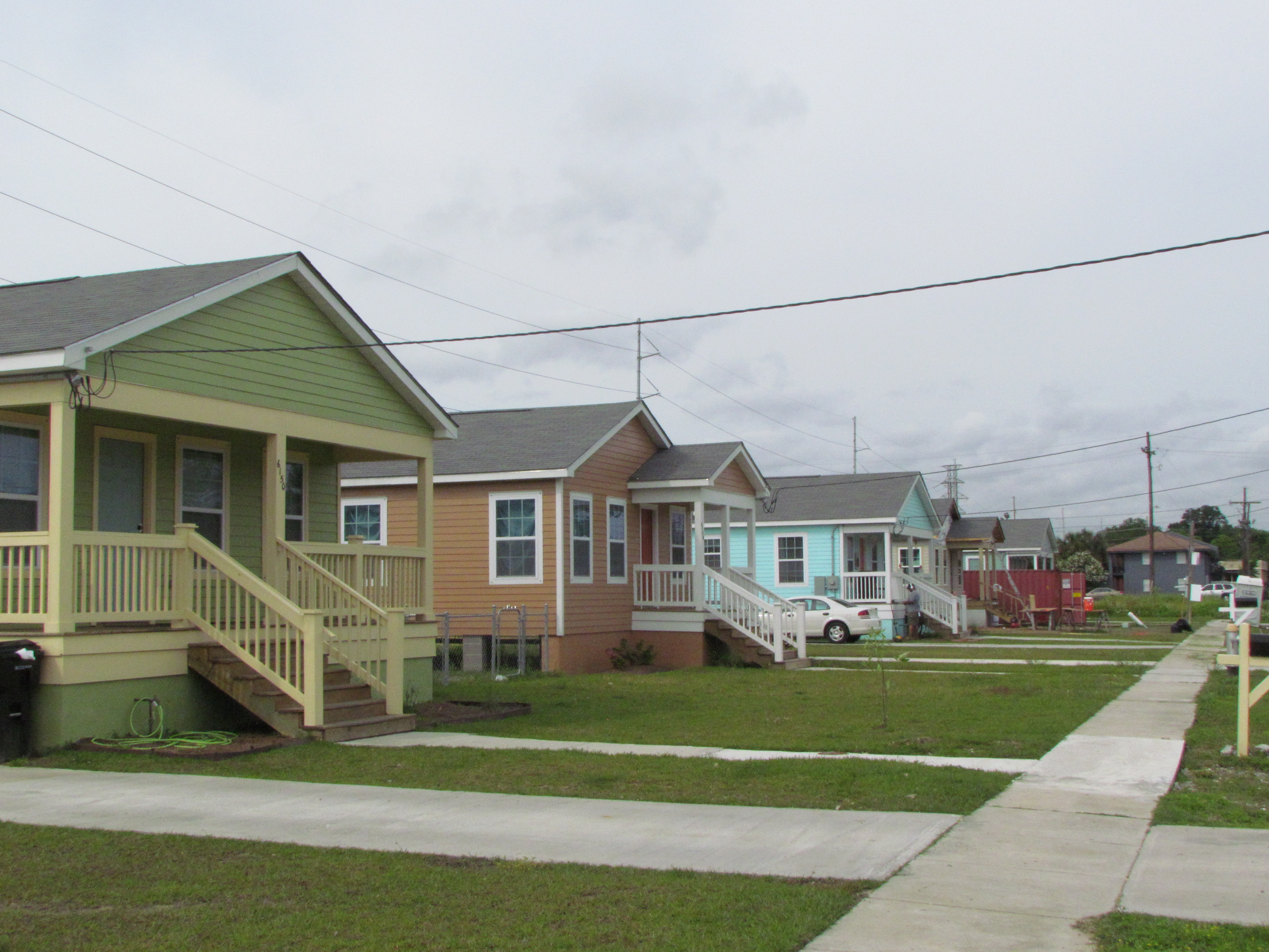 A colorful row of Habitat homes on S. Hermes.
